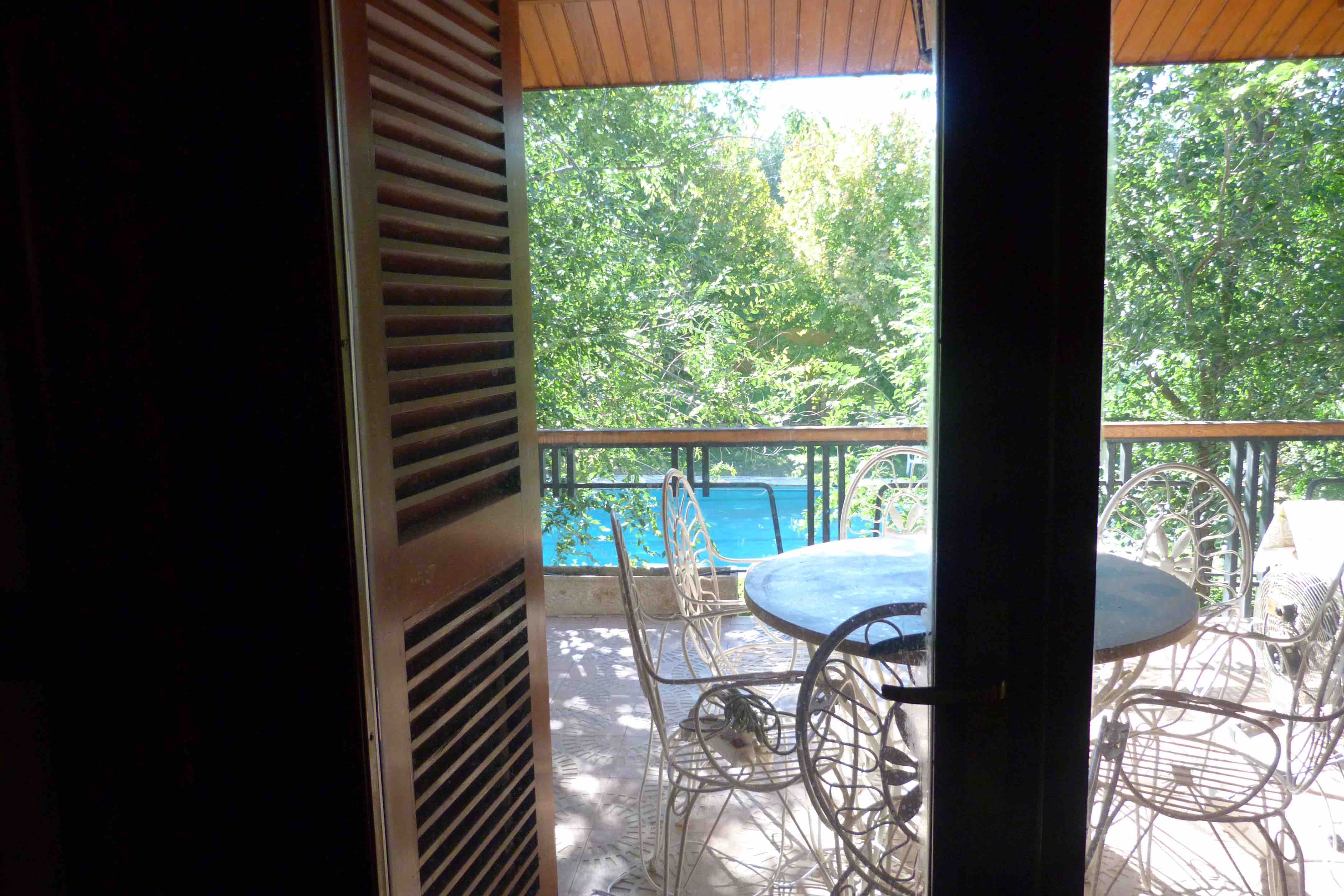 Terraza con vistas a piscina